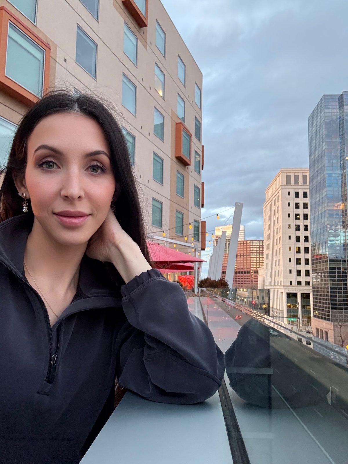 Sarah Elizabeth Spencer on a rooftop in downtown Denver before a court appearance